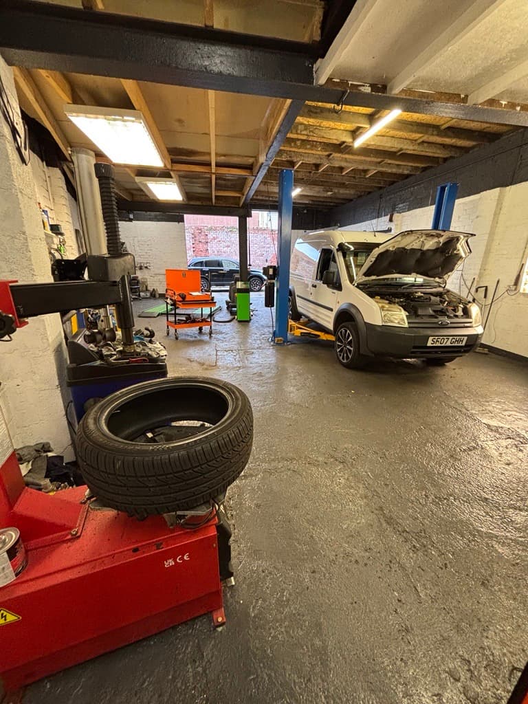 Mechanic working on a car